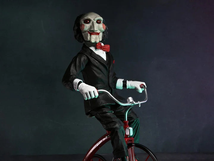 NECA - Saw Billy with riding tricycle (Figura de 12" con sonido)