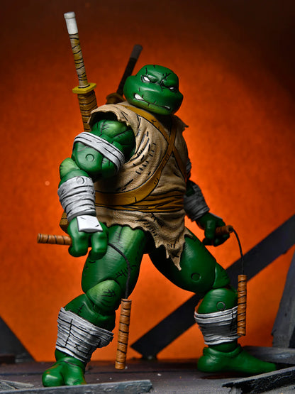 NECA - Teenage Mutant Ninja Turtles (Mirage Comics) - Michelangelo (The Wanderer) (Figura de 7")