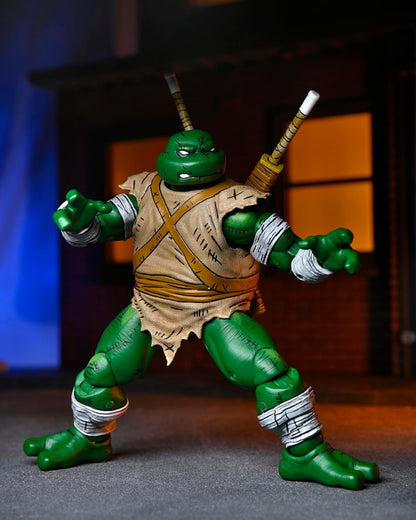 NECA - Teenage Mutant Ninja Turtles (Mirage Comics) - Michelangelo (The Wanderer) (Figura de 7")