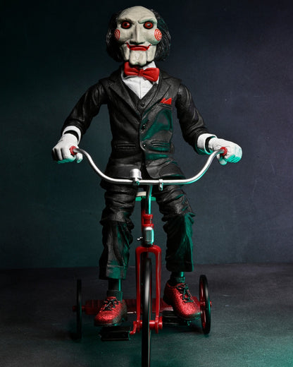 NECA - Saw Billy with riding tricycle (Figura de 12" con sonido)