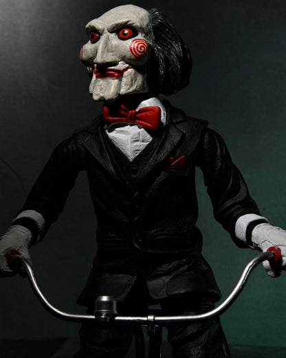 NECA - Saw Billy with riding tricycle (Figura de 12" con sonido)