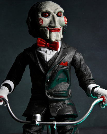 NECA - Saw Billy with riding tricycle (Figura de 12" con sonido)